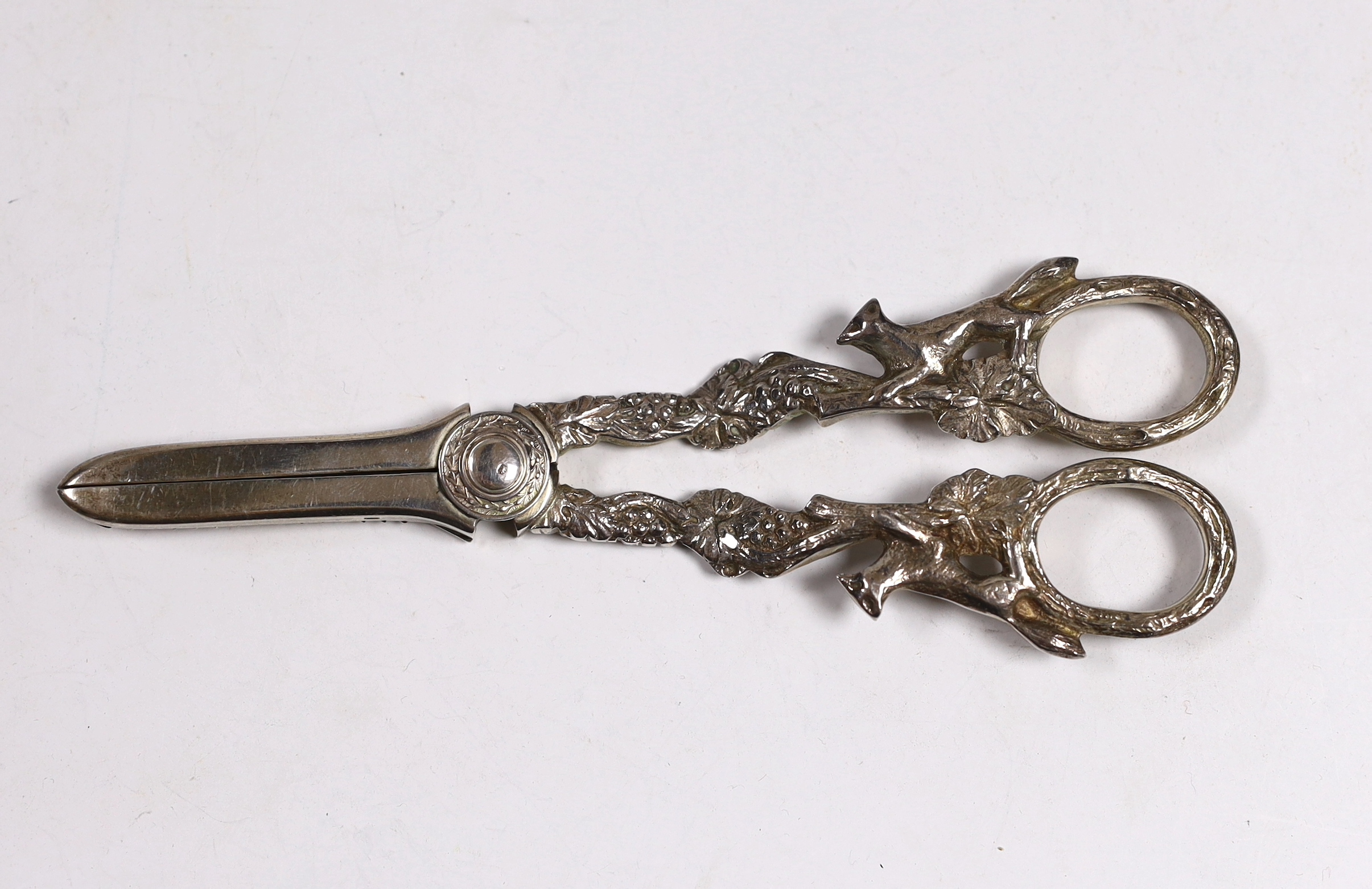 A pair of Elizabeth II silver grape shears, with fruiting vine and fox handles, Cooper Brothers & Sons, Sheffield, 1971, 16cm.